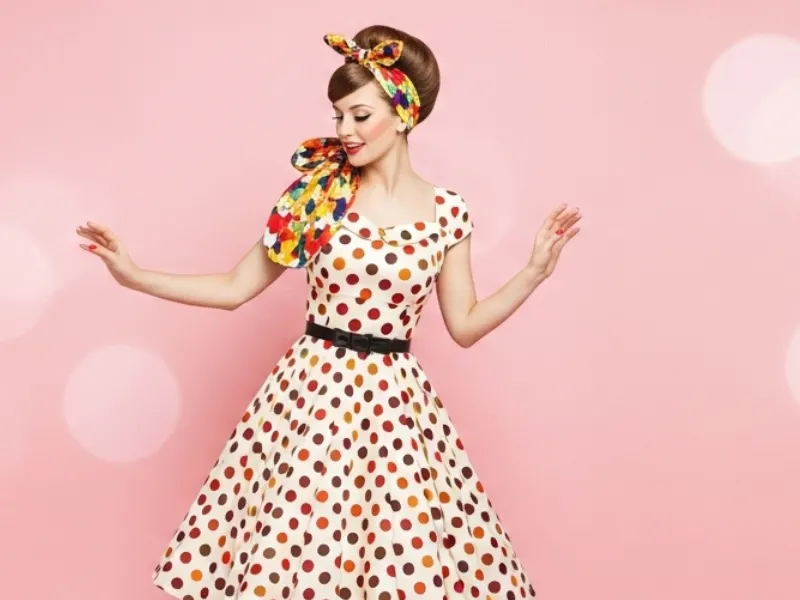 Retro roll hairstyle with a vintage headband